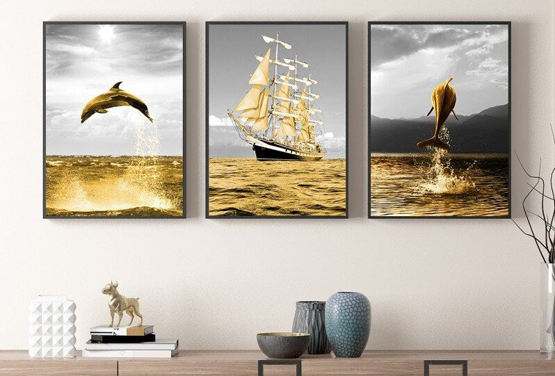 Modern framed marine wall art, seascape canvas print in floating frame, set of 3 prints in gold grey colors, painting with dolphin and ship