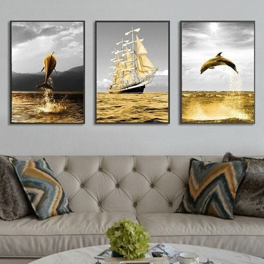 Modern framed marine wall art, seascape canvas print in floating frame, set of 3 prints in gold grey colors, painting with dolphin and ship